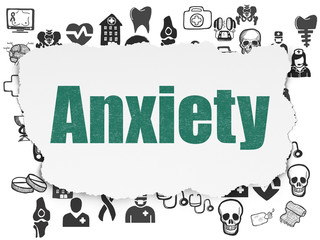 Health concept: Painted green text Anxiety on Torn Paper background with  Hand Drawn Medicine Icons