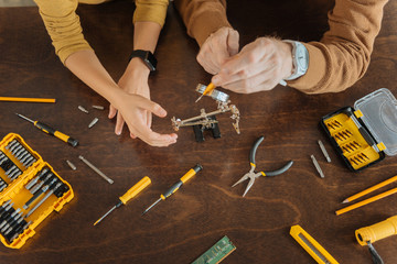 Professional workspace. Top view of a working space with different instruments being scattered in it