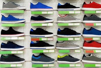 Big collection of different sport shoes.