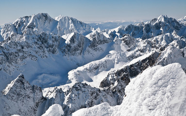 Fototapeta na wymiar Beautiful snowy hills in High Tatras mountains, Slovakia
