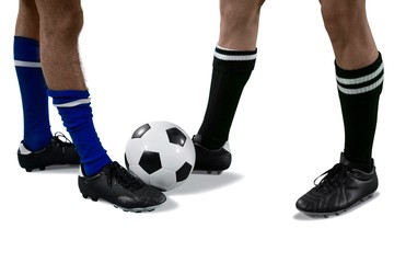 Two football players playing football