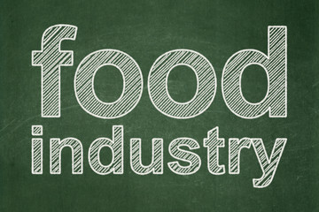 Obraz premium Manufacuring concept: text Food Industry on Green chalkboard background