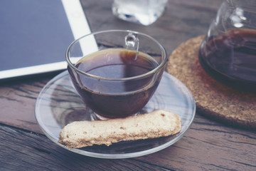 coffee cup on the wooden table in cafe