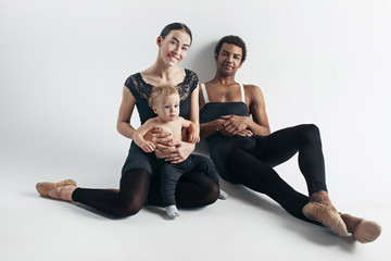 Fototapeta premium A happy family on white background