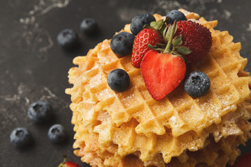 Round belgium waffles with berries