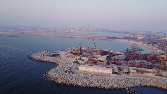 Aerial view of Dubai seaport United Arab Emirates . Top view of the construction of a water port in Dubai