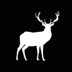 White silhouette of reindeer with big horns isolated on black background.