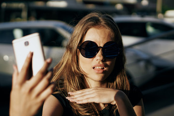 young woman, phone, selfie, street