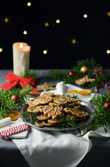 Gingerbreads on table with decorations