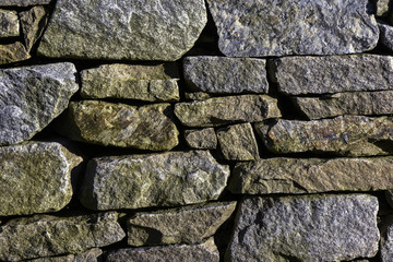 Textura large flat stones lined up.