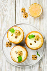 Vegetarian gluten free stuffed baked apples with raisins and honey. Top view, space for text.