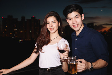 Young asian couple party