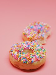 Miniature people painting color on donut,miniature world concept