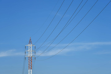  Electricity line and electricity post with blue sky background