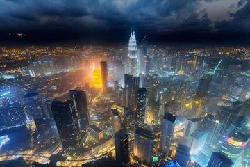 Foto auf Acrylglas Aerial skyline view to Kuala Lumpur city, Malaysia. Cityscape business skyscrapers night downtown background © Ivan Kurmyshov