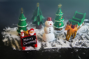 cute happy snowman, reindeer, gift box, Santa and pine trees doll,  Concept for Xmas season