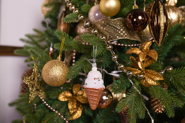 Christmas decorations on the branches of fir tree.