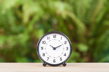 Alarm clock on table.