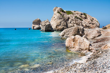 Fototapeta na wymiar Love beach. Aphrodite's Rock - Aphrodite's birthplace near Paphos City. The rock of the Greek (Petra tou Romiou). Cyprus island