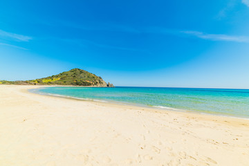 Blue sea and white sand in Cala Monte Turno