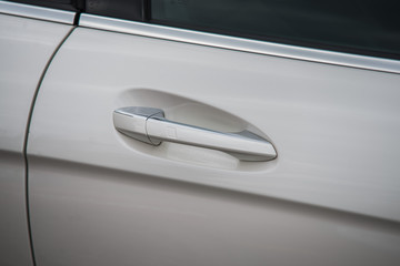 Fototapeta premium Close up on car dor loc and handle