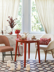 living room decoration style in front of the window home ornamnet middle stand room chair and carpet decor retro floor