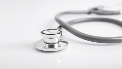 stethoscope on white desk office hospital. device for doctor.