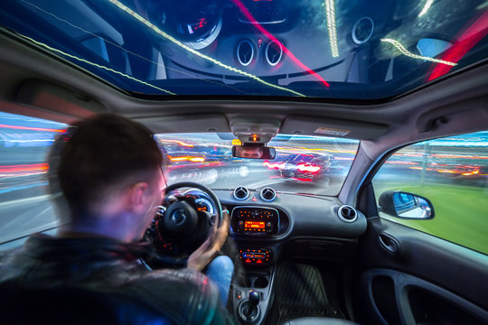 Night city road view from inside car