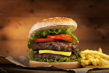 Craft beef burger and french fries. 