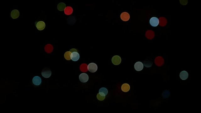 Colorful blurry lights flashing on black background. 1920x1080, full hd