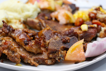 Closeup detail of  homemade roast beef meal with vegetables