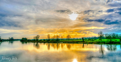 sunset on the river  © Tomasz