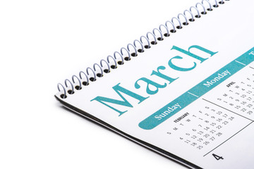 Desk top calendar March close up on white background