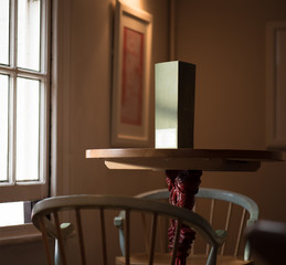 public house wrought iron table with chairs and generic menu