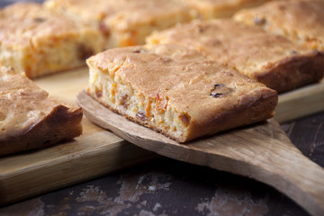 A piece of a pie of semolina with carrots
