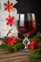 red wine in a glass on a festive background