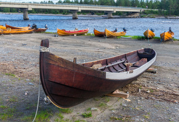 Obraz premium Wooden boats on the river bank, Finnmark, Norway