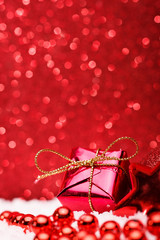 Christmas composition of Christmas tree toys on a red background