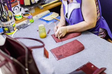 woman manufacturing bags