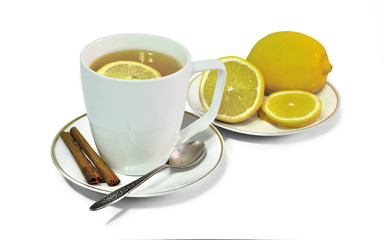 Cup of aromatic cinnamon tea with lemon isolated on white