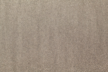 Textured wet sand background