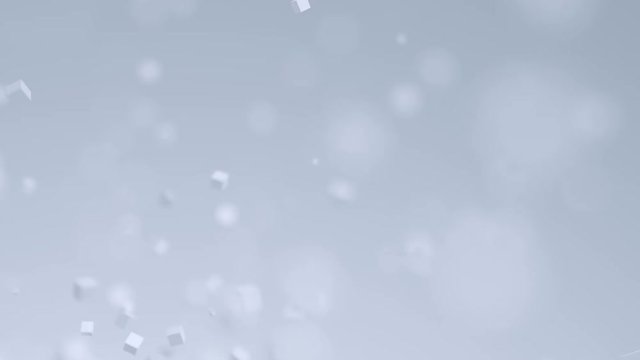 Abstract 3d rendering of chaotic particles. Computer generated flying polygonal cubes in empty space. Futuristic motion background design with bokeh effect. 4k UHD