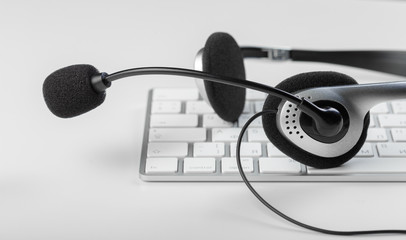 headset on keyboard computer laptop