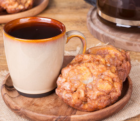 Glazed Apple Fritter and Cup of Coffee