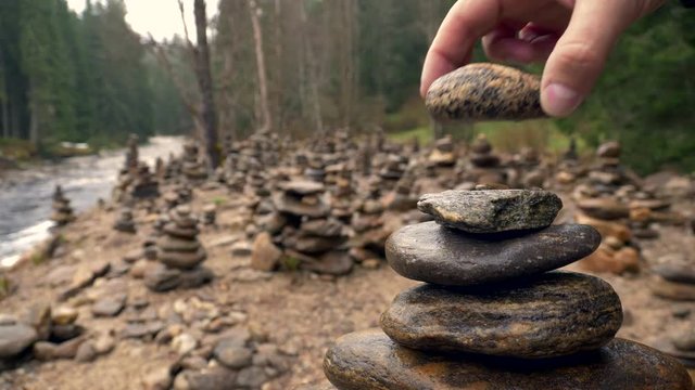 Rock balancing at the river