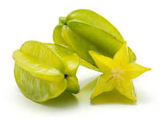 Two carambola and one half isolated on white background.