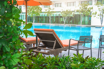 Relaxing pool bed beside swimming pool