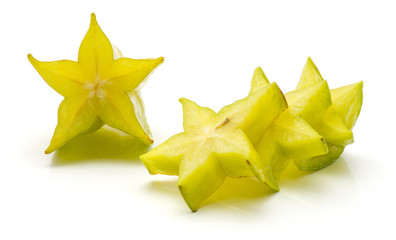 Fototapeta premium Sliced carambola isolated on white background four star slices.