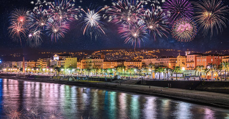 Night view of Nice with fireworks on the black sky , Cote d'Azur, French Riviera, France