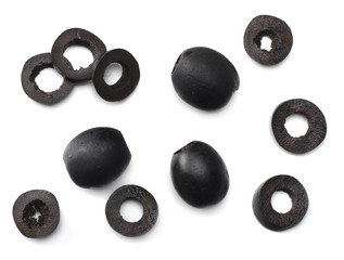 Marinated slices black olives isolated on white background. top view